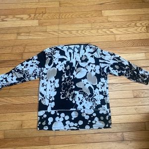 Chicos size 2 work blouse (equates to a large).